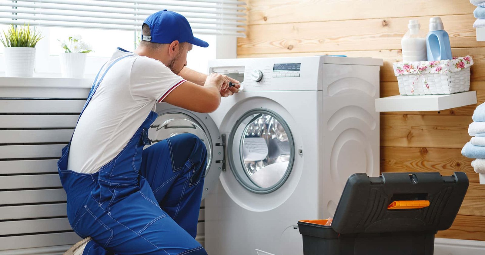 Repair-Man-Fixing-Washing-Machine